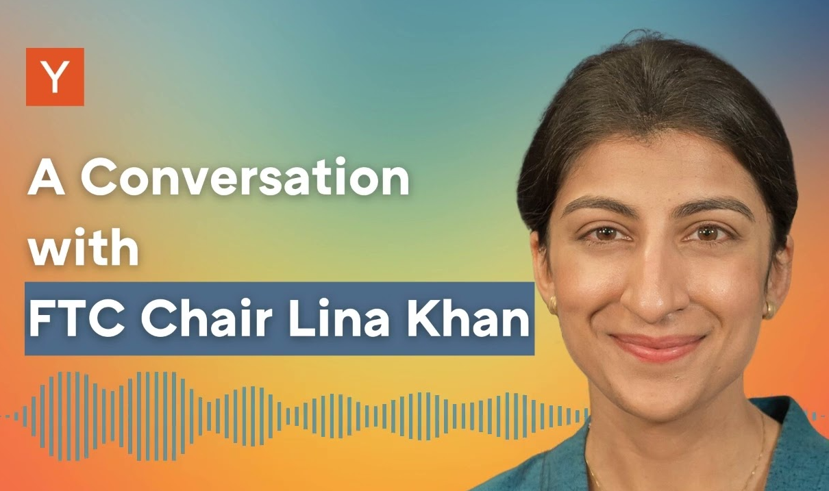 FTC Chair Lina Khan in front of the text "A conversation with FTC Chair Lina Khan"